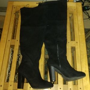 Thigh high heeled boots